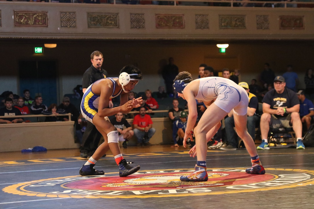 Wrestlers compete in the championship matchup at the Tim Brown Memorial Tournament at Memorial Auditorium in Sacramento, Jan. 14, 2017. The tournament is dedicated to Lance Cpl. Timothy W. Brown, a Sacramento native and former Foothill High School wresters who was killed in action in Al Anbar province, Iraq, on Nov. 15, 2006, while serving as an infantryman with 2nd Battalion, 3rd Marine Regiment. Each year, his alma matter hosts a wrestling tournament featuring hundreds of top-tier athletes from throughout California.
(U.S. Marine Corps photo by Staff Sgt. Jacob H. Harrer)
