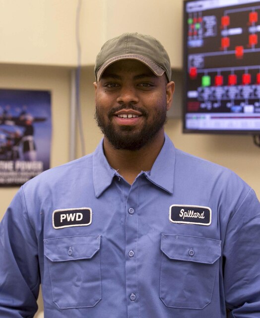 Mike Spillard, boiler plant operator, Public Works Division, enjoys building and assembling components and has plans to study engineering in Japan. Spillard, a former Marine intelligence specialist, is learning Japanese while he saves up to go to college. (Official Marine Corps photo by Cpl. Thomas Mudd/Released)