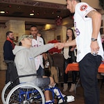 Houston Astros pitcher Joe Musgrove shakes hands with a wounded Soldier while Astros outfielder Tony Kemp looks on during the 2017 Houston Astros Caravan visit to the Warrior and Family Support Center on Jan. 18 at Joint Base San Antonio-Fort Sam Houston. U.S. Army photo by Tim Hipps, Army North Public Affairs