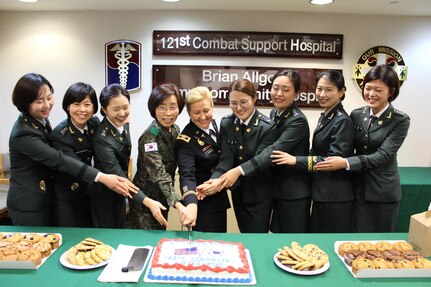 The Brian Allgood Army Community Hospital/121st Combat Support Hospital Commander, Col. Erica Clarkson was joined by Brig. Gen. Won Suk Yon, Superintendent of the Korea Armed Forces Nursing Academy and the 123rd cycle graduating class of the Integrated Service of Republic of Korea Military Health Care Personnel Program (ISRMHCPP) January 12, 2017 at the BAACH. The ISRMHCPP was established in 1955 to facilitate wartime coordination between the U.S. military forces and ROK military health care support system in the event of hostilities. ROK Army officers work with their counterparts for six months, sharing expertise and increasing cultural understanding while gaining an appreciation of the US Military health care system.