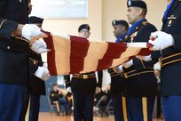 Army Reserve Soldiers assigned to the 85th Support Command headquarters conduct a flag folding during the command's retirement ceremony, Jan. 7, 2017. Three Soldiers, assigned to the command, retired with a combined 82 years of service.
(Photo by Sgt. Aaron Berogan)