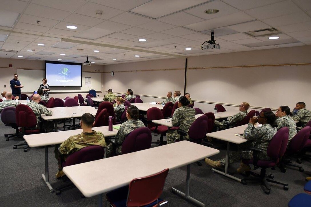 Representatives from Harper College visit the command to provide insight on educational benefits for Soldiers during the Soldier's battle assembly weekend, Jan. 7, 2017.
(Photo by Sgt. Aaron Berogan)

