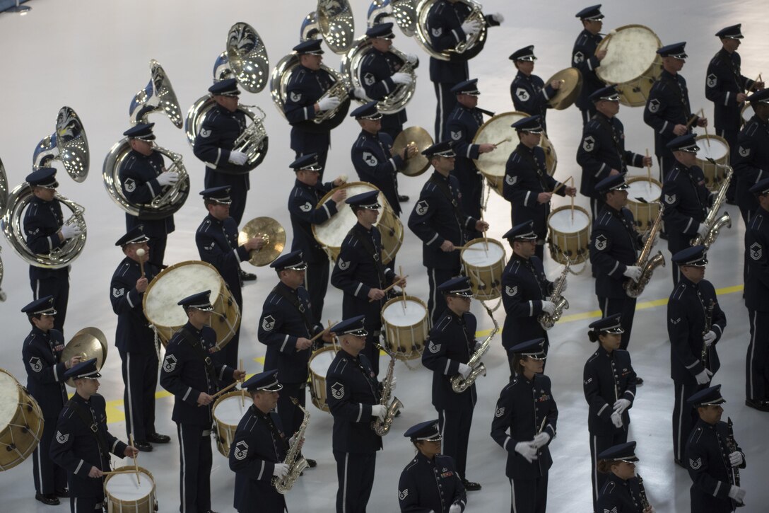 U.S. Air Force Band members perform the Air Force service song during 58th Presidential Inauguration’s Air Force Media Day at Joint Base Andrews, Md., Jan. 13, 2017. During the event, press members were able to attend question and answer sessions, view demonstrations and interview subject matter experts about the Air Force’s role during the inauguration. 