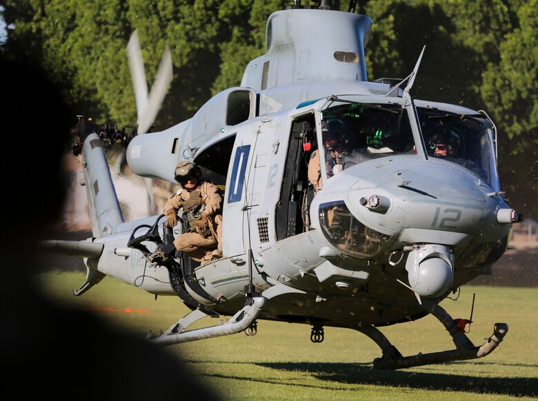 A UH-1Y helicopter with Marine Aviation Weapons and Tactics Squadron One lands to offload personnel to render aid and provide disaster relief to displaced civilians, role-players, at Kiwanis Park in Yuma, Ariz. during a Humanitarian Assistance/Disaster Relief (HA/DR) Exercise, part of the Weapons and Tactics Instructor Course 1-17, Friday, October 14, 2016. The training exercise enabled ground, aviation and support Marines and sailors to work as a team to practice deploying medical personnel, supplies, and extract personnel and people displaced from their communities.