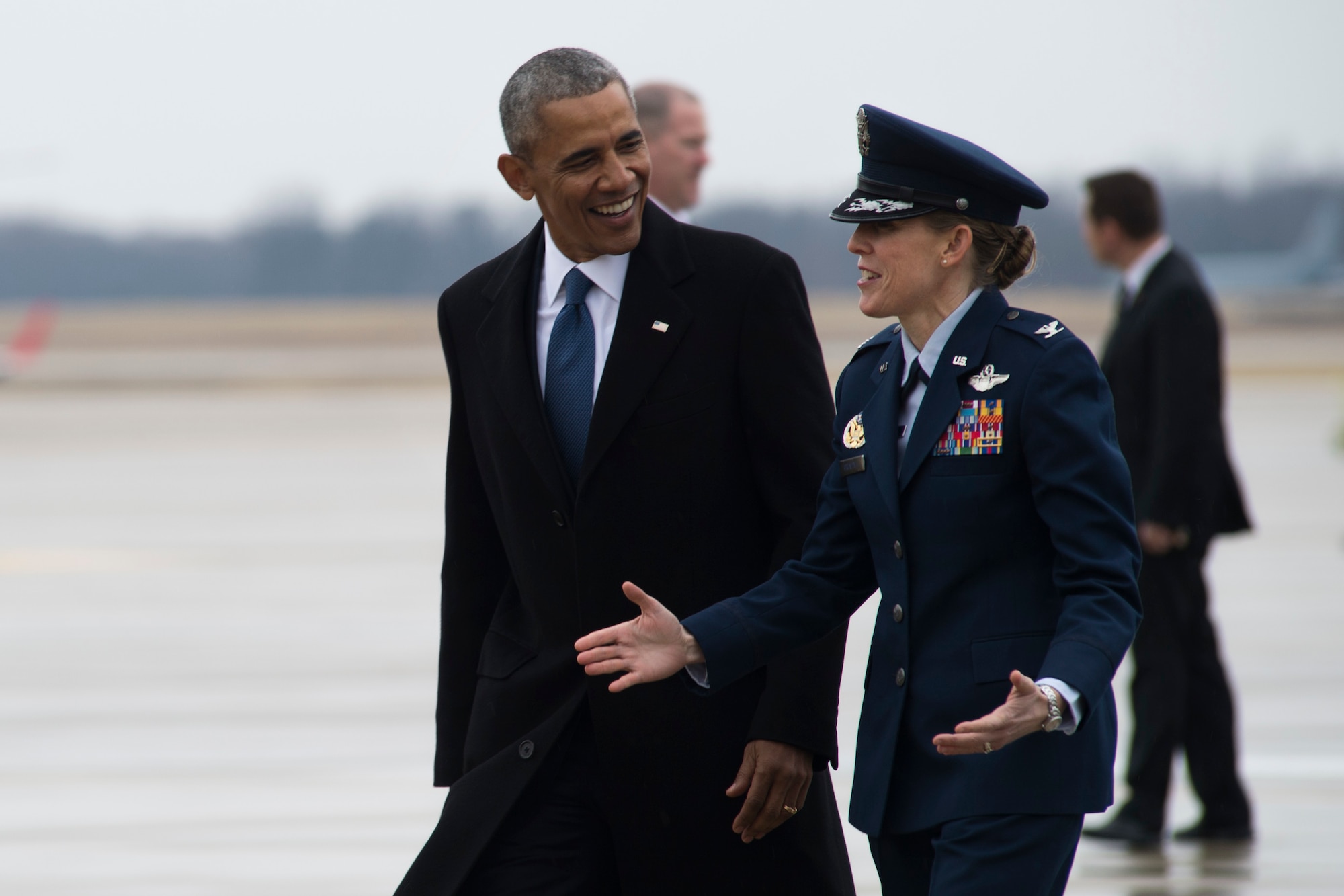 Former President Barack Obama is greeted by Col. Julie A. Grundahl, 11th Wing and Joint Base Andrews vice commander, on the flightline at Joint Base Andrews, Md., before his farewell address, Jan. 20, 2017. Throughout his eight-year tenure as president, Obama traveled to and from JBA aboard Air Force One more than 600 times and traveling all over the world. 