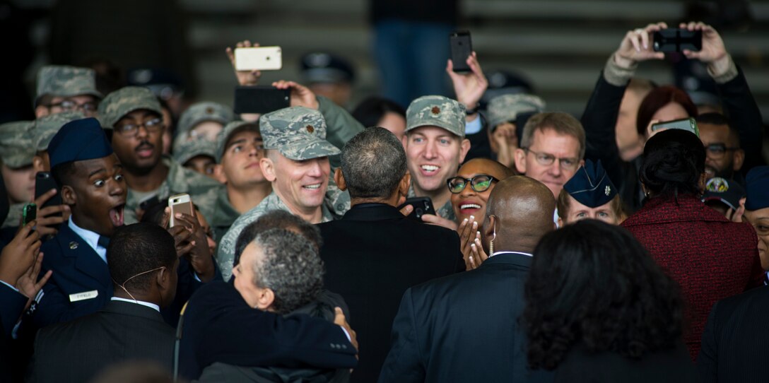 Former President Barack Obama shakes the hand of service members inside hangar six at Joint Base Andrews, Md., Jan. 20, 2017. After his farewell address given from inside hangar six, Obama intends to travel with his family to Palm Springs, Calif.
