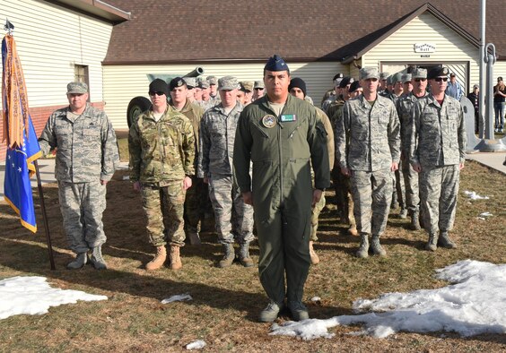 F.E. Warren Airmen pose with Joe Gordy, retired chief master sergeant, at the VFW in Greeley, Colo., Jan. 13, 2017. Chief Master Sgt. Jeffrey Steagall, 90th Missile Wing command chief, rallied approximately 40 Airmen to visit Gordy in order to show appreciation for his service. (U.S. Air Force photo by Airman 1st Class Breanna Carter)