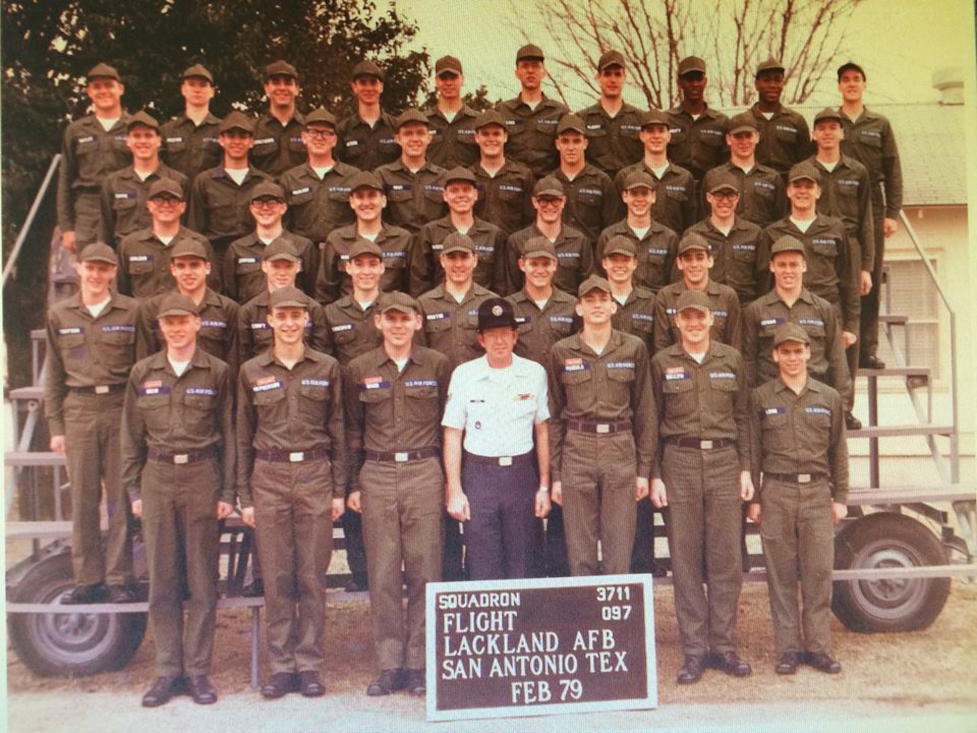 Then-Airman James Dullaghan poses for a group photo with Basic Training Flight 3711, February 1979 at Lackland Air Force Base, Texas. Dullaghan now serves as a dedicated crew chief with the 455th Expeditionary Aircraft Maintenance Squadron at Bagram Airfield, Afghanistan, nearly 38 years after this photo was taken. (U.S. Air Force photo)