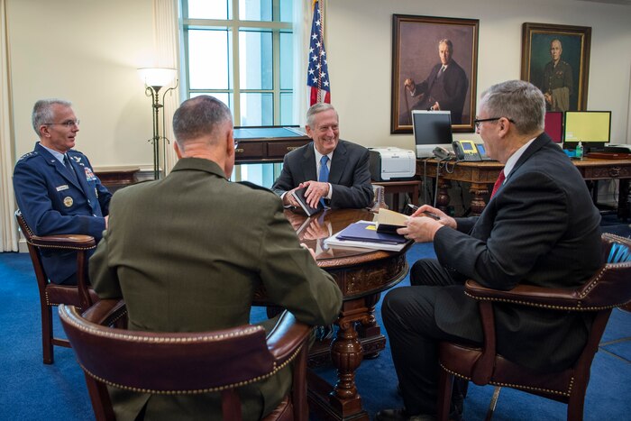 Clockwide from top, Defense Secretary Jim Mattis meets with Deputy Defense Secretary Bob Work; Marine Corps Gen. Joe Dunford, chairman of the Joint Chiefs of Staff; and Air Force Gen. Paul J. Selva, vice chairman of the Joint Chiefs of Staff, at the Pentagon, Jan. 21, 2017. DoD photo by Air Force Tech. Sgt. Brigitte N. Brantley