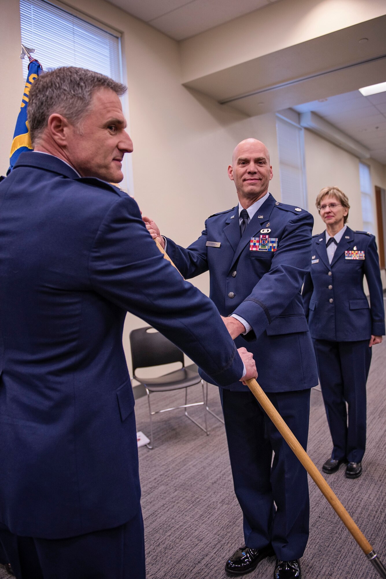 JOINT BASE ELMENDORF-RICHARDSON, Alaska — Lt. Col. Richard Rymerson took control of the 176th Wing Medical Group, Alaska Air National Guard, at a change of command ceremony here Dec. 4. The out-going commander, Col. Sharolyn Lange relinquished control to Rymerson after serving as the group’s commander for four years. (U.S. Air National Guard photo by Tech. Sgt. N. Alicia Halla/released)