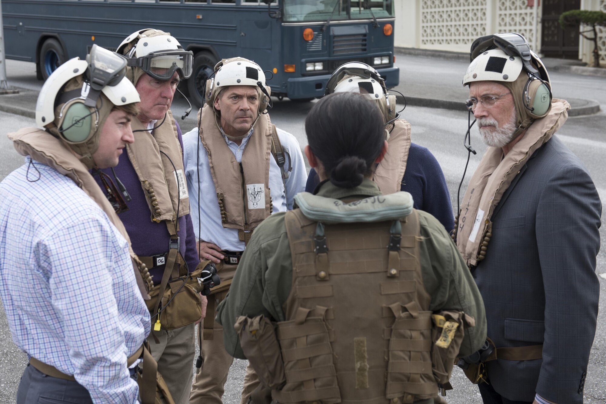 U.S. congressmen meet with U.S. service members during a meet-and-greet Dec. 20, 2016, at Kadena Air Base, Japan. The congressmen discussed quality of life and answered service members’ questions about their respective states. (U.S. Air Force photo by Senior Airman Omari Bernard/Released)