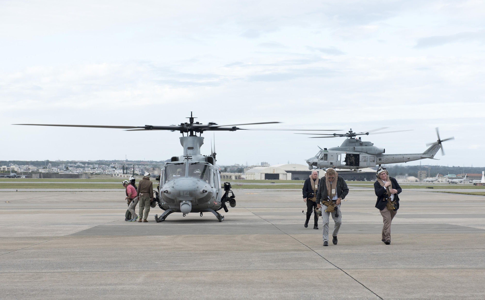 U.S. congressmen meet with U.S. service members during a meet-and-greet Dec. 20, 2016, at Kadena Air Base, Japan. The congressmen discussed quality of life and answered service members’ questions about their respective states. (U.S. Air Force photo by Senior Airman Omari Bernard/Released)