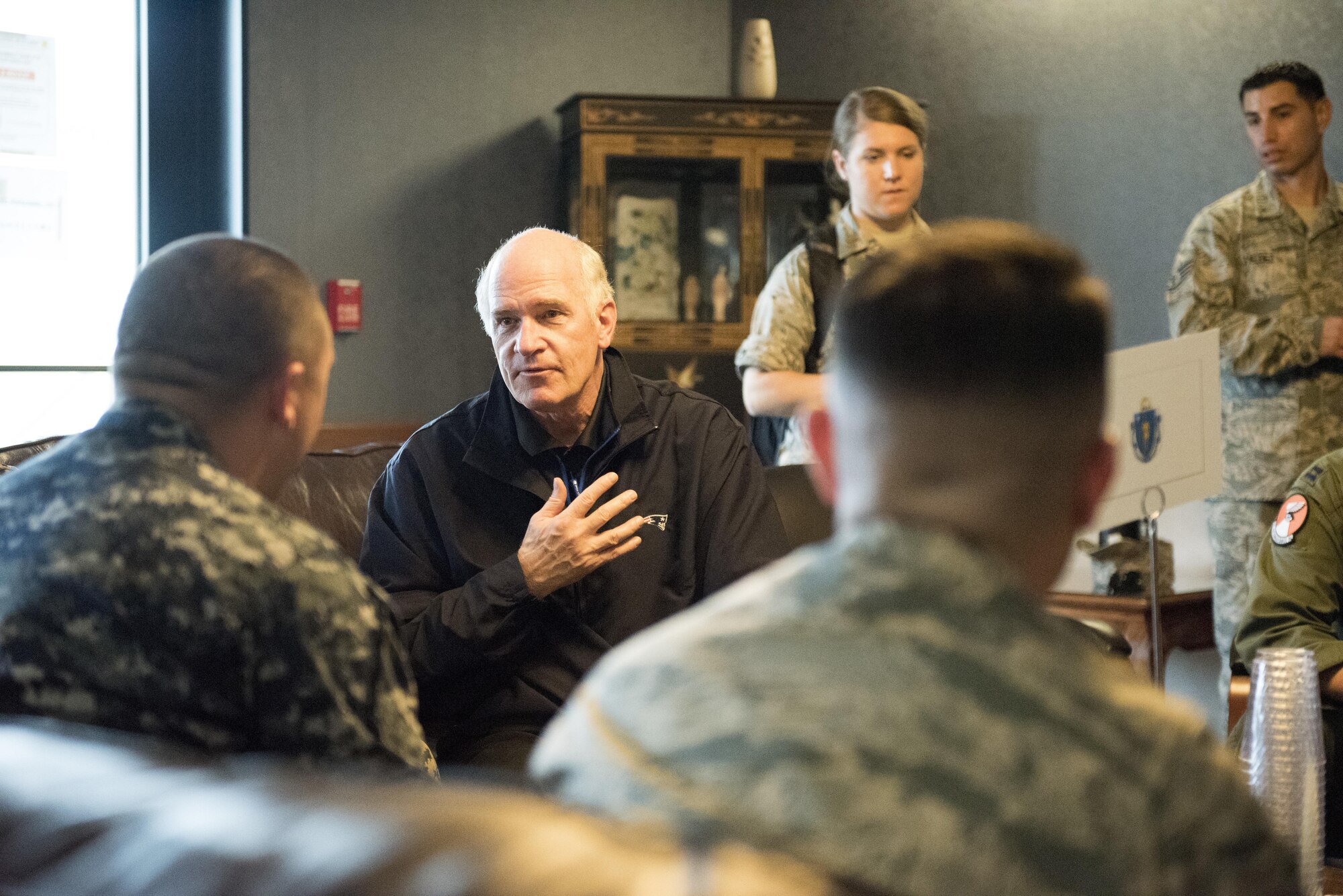 U.S. congressmen meet with U.S. service members during a meet-and-greet Dec. 20, 2016, at Kadena Air Base, Japan. The congressmen discussed quality of life and answered service members’ questions about their respective states. (U.S. Air Force photo by Senior Airman Omari Bernard/Released)