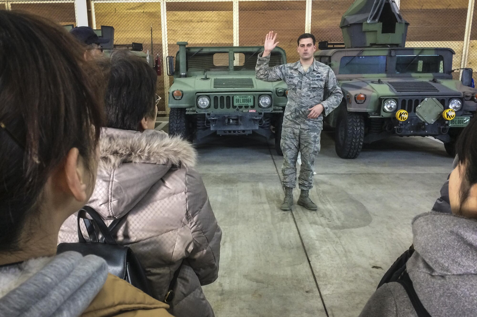 U.S. Air Force Staff Sgt. Justin Beasley, an explosive ordnance disposal technician with the 35th Civil Engineer Squadron, explains how EOD makes use of the M1167 Humvee at home and downrange during a community engagement tour at Misawa Air Base, Japan, Jan. 20, 2017. The M1167 comes equipped with a 6.5-liter turbocharged diesel V-8 engine that nets 190 horsepower and 380 foot-pounds of torque and are protected by armor on all sides of the vehicle. The trucks include special night vision head lights only visible when used with night vision goggles worn on the operator’s helmet. (U.S. Air Force photo by Staff Sgt. Benjamin W. Stratton)