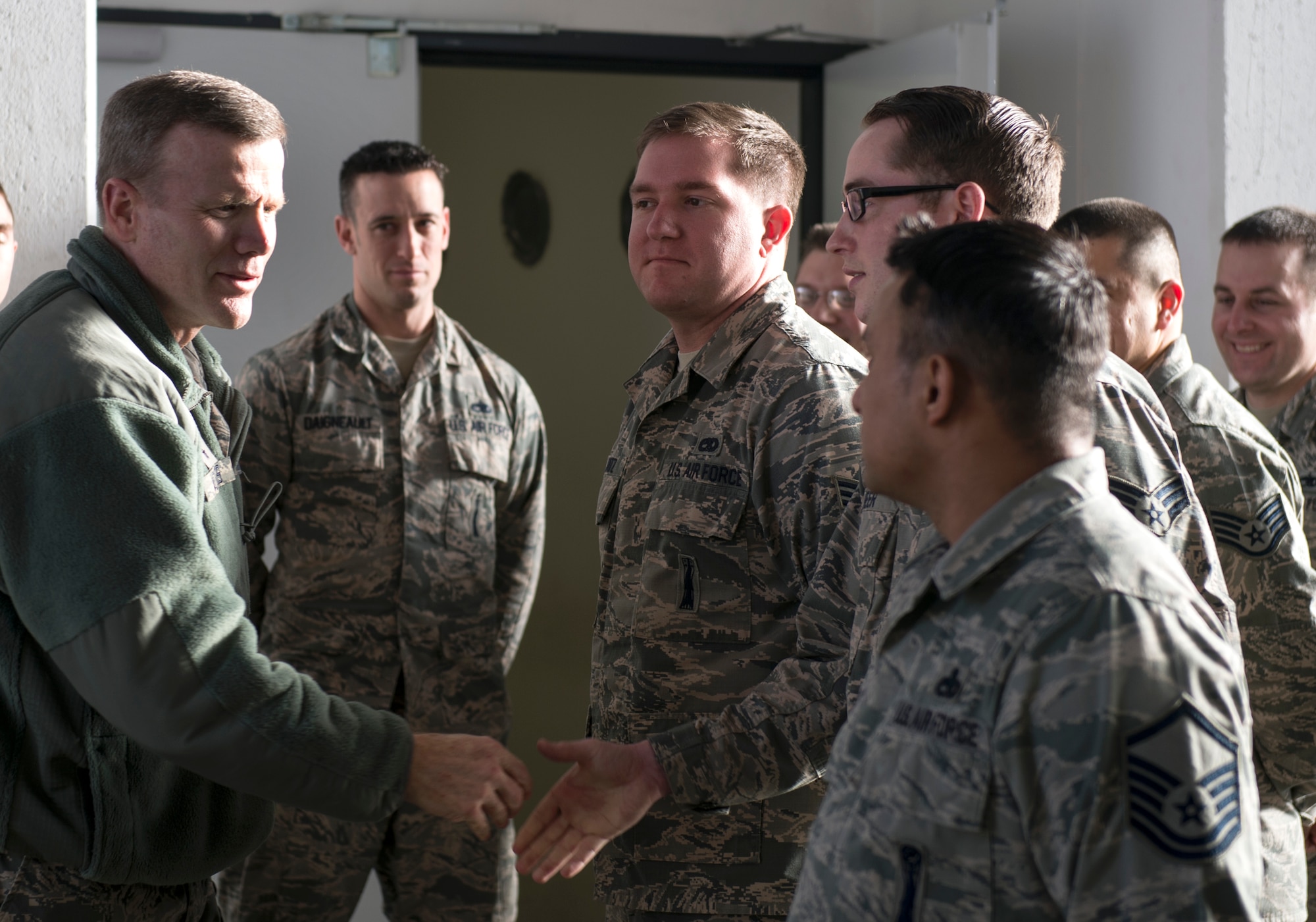 U.S. Air Force Airmen from the 702nd Munitions Support Squadron greet Gen. Tod Wolters, U.S. Air Forces in Europe and Air Forces Africa commander, during a visit to Buechel Air Base, Germany, Jan. 19, 2017. The 702nd MUNSS is a geographically separated unit responsible for receipt, storage, maintenance and control of U.S. war reserve munitions in support of the German air force 33rd Fighter-Bomber Wing. (U.S. Air Force Photo/Senior Airman Dawn M. Weber)