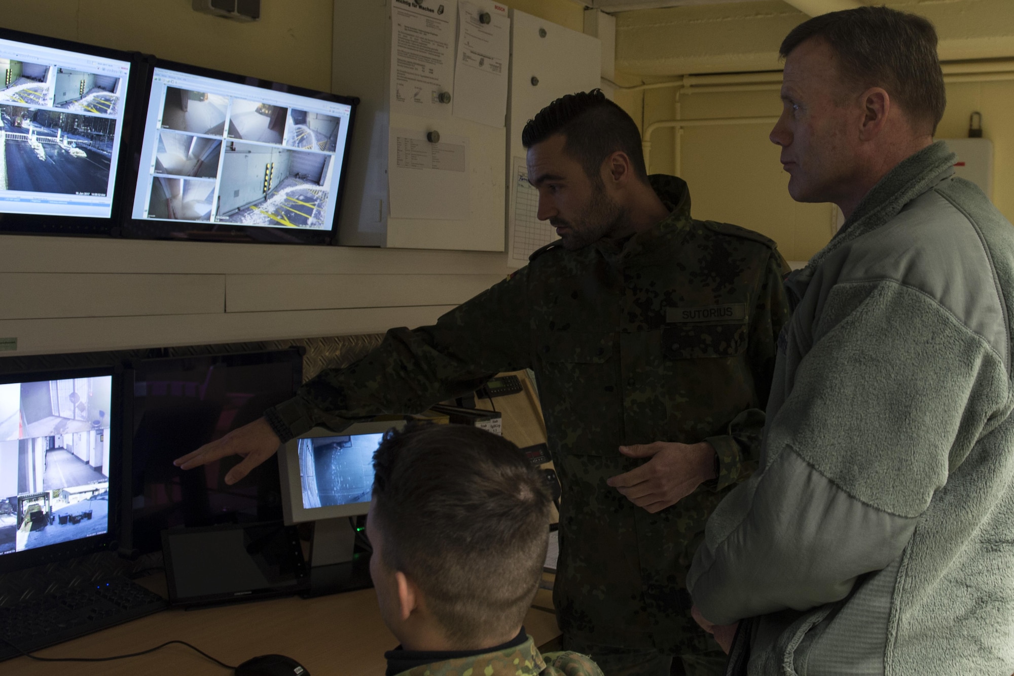 German air force Capt. Sebastian Sutorious, briefs U.S. Air Force Gen. Tod Wolters, U.S. Air Forces in Europe and Air Forces Africa commander, on various security measures used at Buechel Air Base, Germany, Jan. 19, 2017. The 702nd MUNSS is a geographically separated unit responsible for receipt, storage, maintenance and control of U.S. war reserve munitions in support of the German air force 33rd Fighter-Bomber Wing. (U.S. Air Force Photo/Senior Airman Dawn M. Weber)