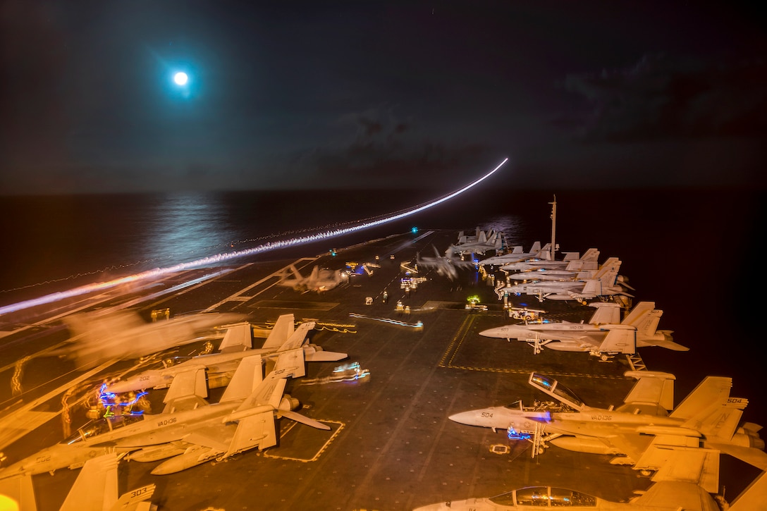 An F/A-18F Super Hornet aircraft launches from the flight deck of the aircraft carrier USS Carl Vinson in the Pacific Ocean, Jan. 14, 2017. Navy photo by Petty Officer 2nd Class Sean M. Castellano