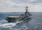 The aircraft carrier USS George H.W. Bush (CVN 77) sails through the Atlantic Ocean. Bush is underway conducting a Composite Training Unit Exercise (COMPTUEX) with the George H.W. Bush Carrier Strike Group in preparation for an upcoming deployment. (U.S. Navy photo by Petty Officer 3rd Class Michael B. Zingaro/Released)