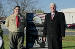 Travis Hartlaub stands with retired Navy Vice Adm. Keith Lippert in front of his completed veteran’s memorial Eagle Scout project at the Littlestown Community Park.