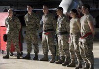 52nd Aircraft Maintenance Squadron Airmen prepare to compete in the annual weapons load competition in Hangar One at Spangdahlem Air Base, Germany, Jan. 20, 2017. The top two teams went head-to-head to determine the wing’s best load crew. The winning team’s completion time will be compared to other squadrons in the Major Command to determine the best load crew in United States Air Forces in Europe. Wing winners will be announced at the Maintenance Professional of the Year banquet March 10, 2017. (U.S. Air Force photo by Airman 1st Class Preston Cherry)