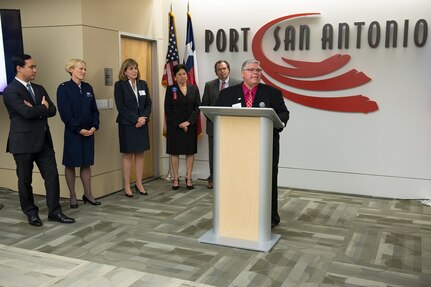 Juan Solis, Port San Antonio Board of Directors speaks about the history of Kelly Field during its 100th anniversary celebration Jan. 18, 2017, at Port San Antonio.