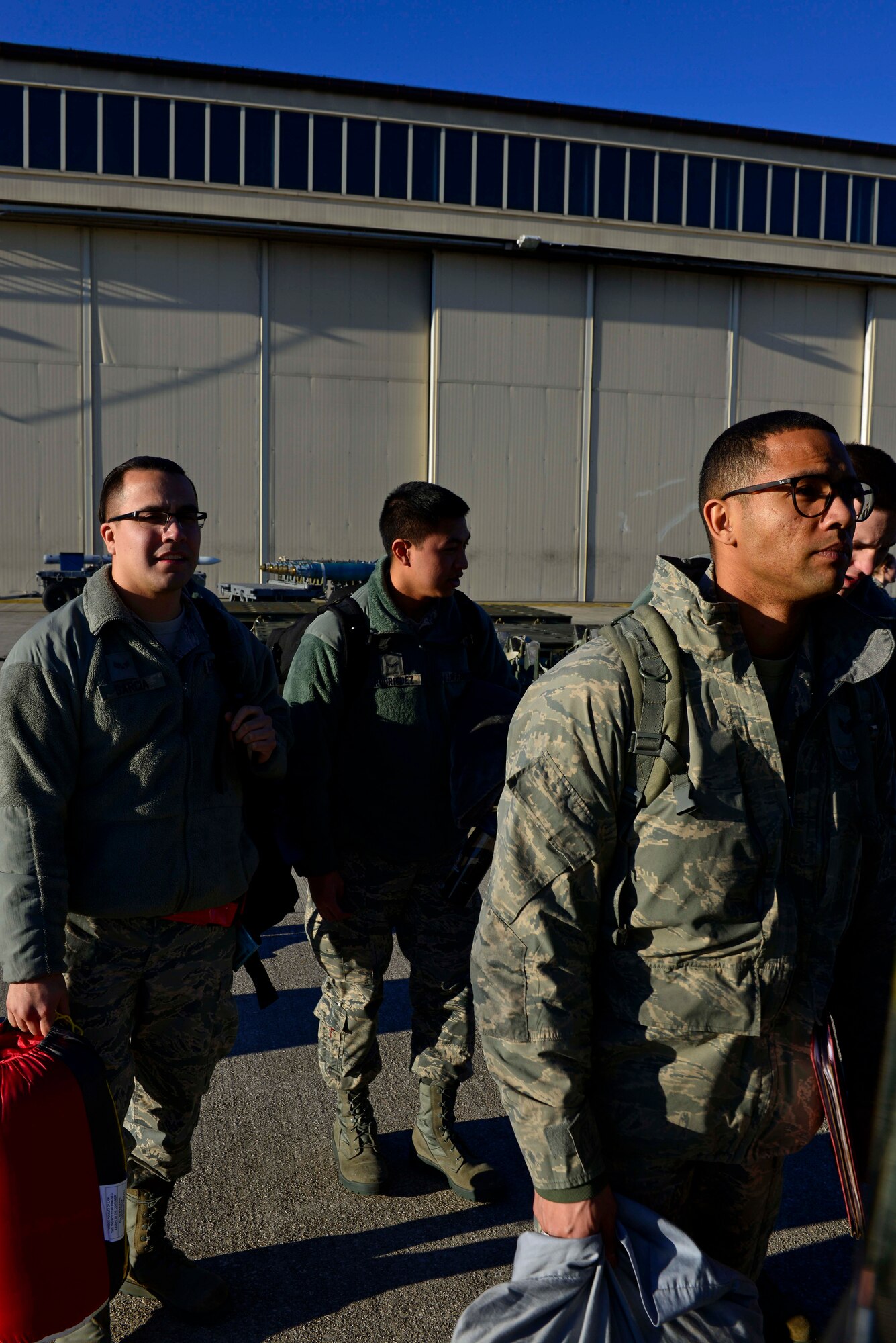 Airmen from the 31st Fighter Wing board a bus at Aviano Air Base, Italy on Jan. 21, 2017. The Airmen flew on a C-130 Hercules to Souda Bay, Greece to support a flying training detachment with the Hellenic air force. (U.S. Air Force photo by Senior Airman Cary Smith)