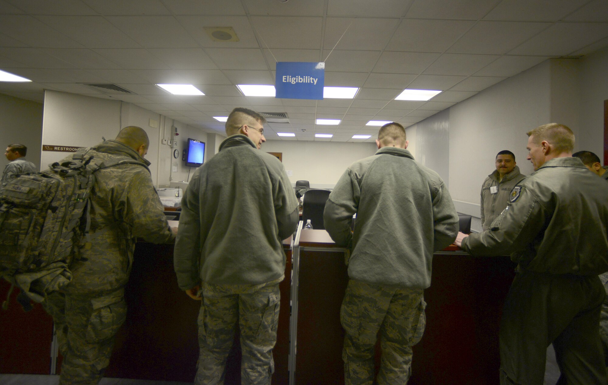 Airmen deploying to Souda Bay, Greece process through a personnel deployment function line at Aviano Air Base, Italy on Jan. 16, 2016. The Airmen traveled to Souda Bay, Greece, to support a flying training detachment with the Hellenic air force. (U.S. Air Force photo by Staff Sgt. Krystal Ardrey)