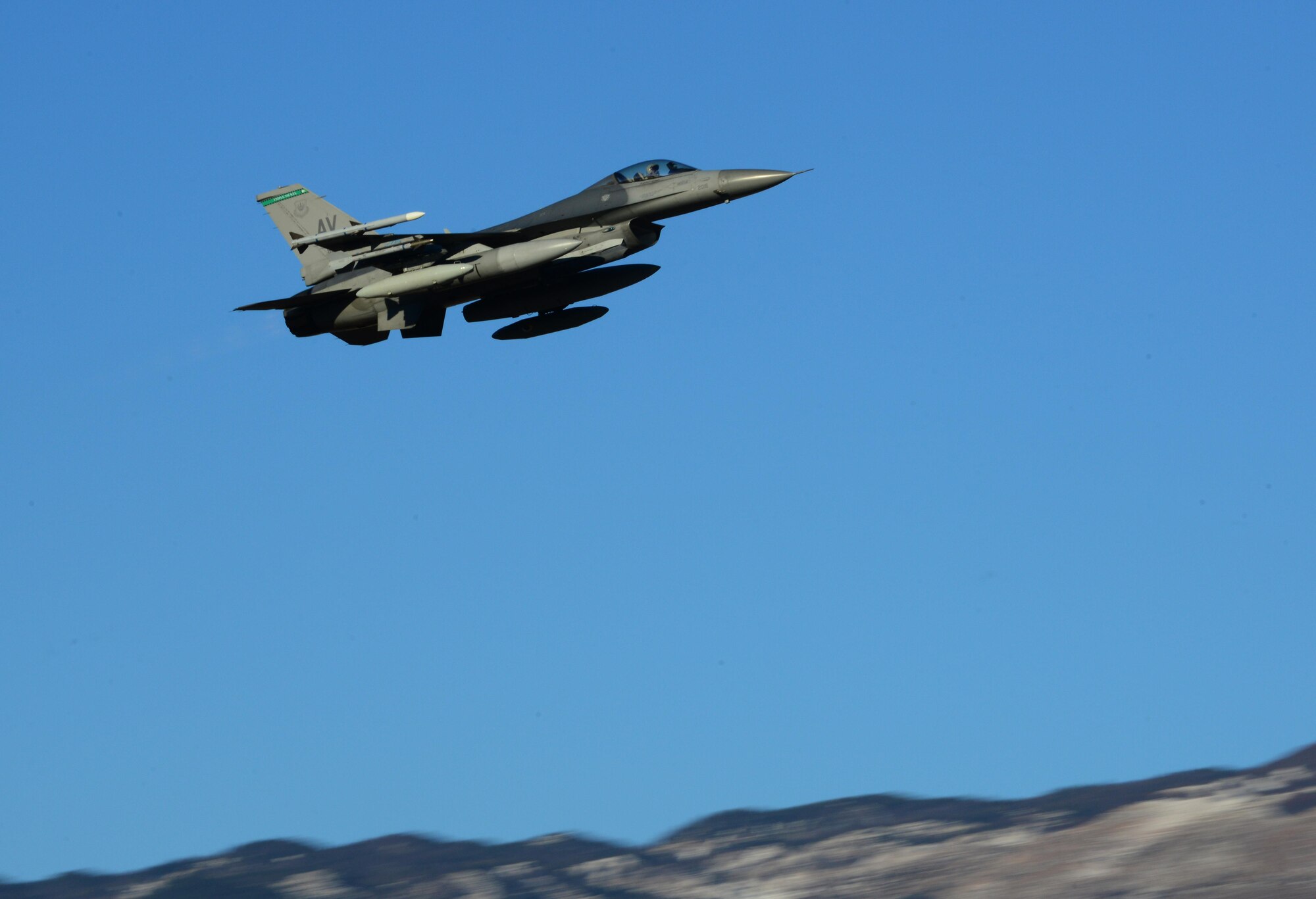 A 555th Fighter Squadron F-16 Fighting Falcon departs from Aviano Air Base, Italy on Jan. 21, 2016 to support a flying training deployment in Souda Bay, Greece. Fourteen F-16s, one KC-135 Stratotanker from the Arizona Air National Guard’s 161st Air Refueling Wing, and 280 Airmen deployed to Souda Bay to train with Greece’s Hellenic air force. (U.S. Air Force photo by Staff Sgt. Krystal Ardrey)