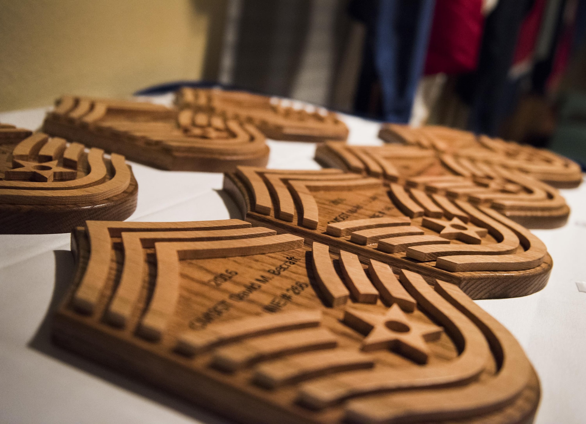 Chief master sergeant plaques await the base’s newest chiefs during a recognition ceremony Jan. 20 at Eglin Air Force Base, Fla.  Six new chiefs were recognized during the formal ceremony and dinner.  (U.S. Air Force photo/Samuel King Jr.)