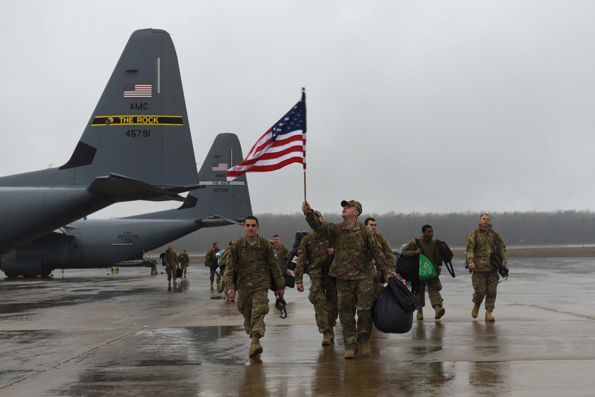 U.S. Air Force Airmen arrive home after a six-month deployment to Southwest Asia Jan. 19, 2017, at Little Rock Air Force Base, Ark. Team Little Rock Airmen specialize in providing rapid, global mobility to support humanitarian and wartime operations. (U.S. Air Force photo by Airman 1st Class Kevin Sommer Giron)