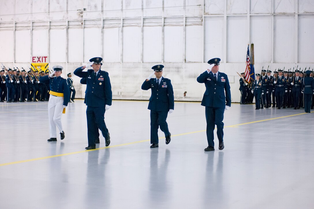 Members of Joint Base Andrews leadership, to include Col. David A. Owens, 459th Air Refueling Wing commander (right), salute during a Presidential Inauguration Parade pass and review practice at Joint Base Andrews, Maryland, Jan. 13, 2017. (U.S. Air Force photo/Tech. Sgt. Kat Justen)