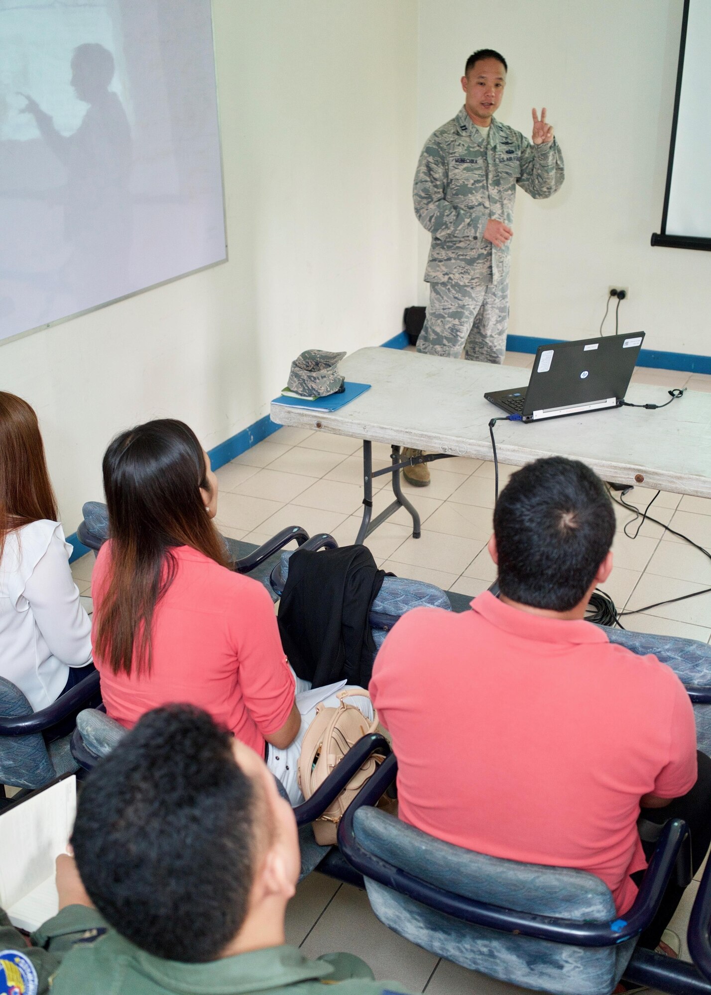 U.S. Air Force Capt. Jay Munechika, Eagle Vision 5 officer-in-charge, introduces himself to a group of Philippine Air Force members, Clark Air Base, Philippines, Jan. 16, 2017. Munechika and the Philippine Airmen are participating in a Subject Matter Expert Exchange (SMEE) by the U.S. Air Force. The goal of the SMEE is to bring together both nations' air forces to enhance their combined readiness through satellite imagery and planning Humanitarian Assistance and Disaster Relief operations common in the Asia-Pacific. (U.S. Air Force photo by Tech. Sgt. James Stewart/Released)