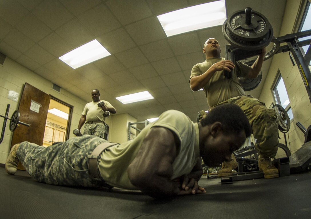 U.S. Army Reserve Soldiers with Co. C, 324th Expeditionary Signal Battalion exercise during their lunch break in the 335th Signal Command (Theater) headquarters building in East Point, Ga., Jan. 21, 2017. 