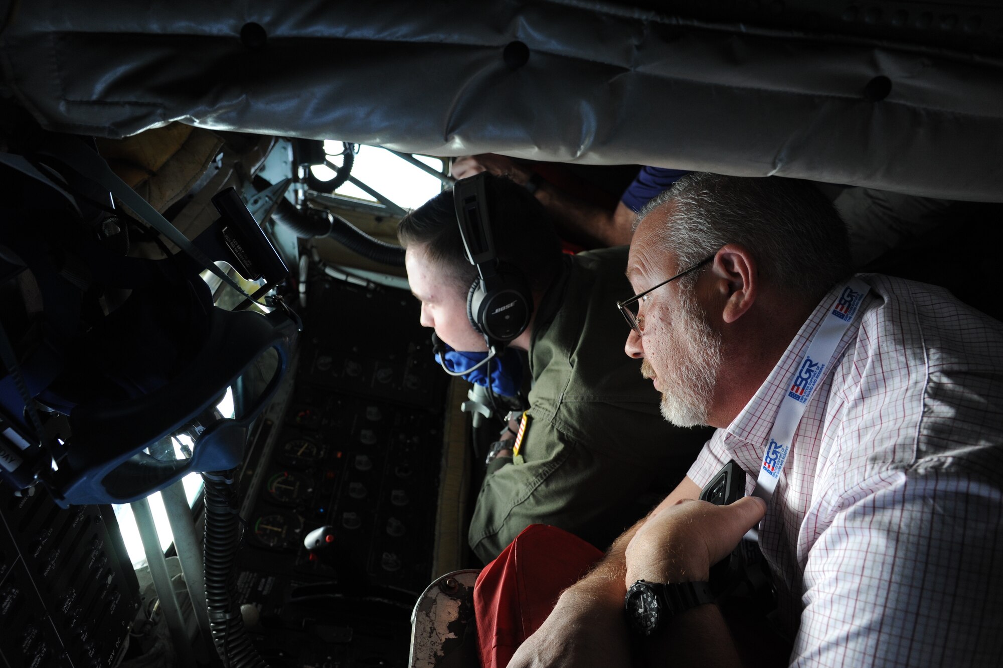 Paul Stellrect, City of St. Petersburg, witnesses an air-to-air refueling of a C-17 from the boom pod of a KC-135 during the 927 ARW/ESGR bosslift, January 19, 2017. One of the goals of the bosslift was to provide the civic leaders an understanding of the primary mission at MacDill Air Force Base, air refueling.  (U.S. Air Force photo by Tech Sgt. Peter Dean)