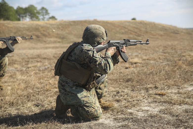 A Marine with Task Force Southwest fires an AK-47 during foreign weapons and familiarization training at Camp Lejeune, N.C., Jan. 17, 2016. About 30 Marines with the unit completed the training in the event they must use a foreign weapon system while deployed to Helmand Province, Afghanistan. The Marines are scheduled to deploy as part of Task Force Southwest to train, advise and assist the Afghan National Army 215th Corps and the 505th Zone National Police. (U.S. Marine Corps photo by Sgt. Lucas Hopkins)