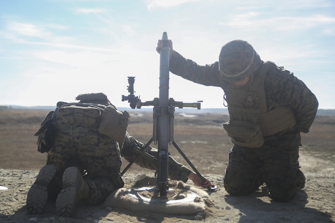 Marines with Task Force Southwest fire an M224 60mm mortar during a live-fire range at Camp Lejeune, N.C., Jan. 18, 2016. Task Force Southwest is comprised of about 300 Marines whose mission will be to train, advise and assist the Afghan National Army 215th Corps and the 505th Zone National Police. The unit is scheduled to deploy in the Spring. (U.S. Marine Corps photo by Sgt. Lucas Hopkins)
