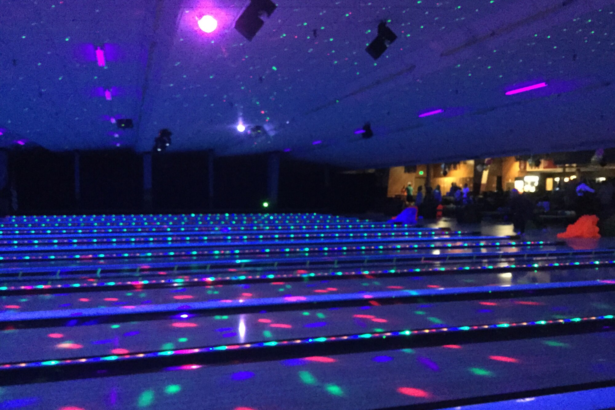 PETERSON AIR FORCE BASE, Colo. – New lights were installed for glow bowling at the Peterson Air Force Base Bowling Center Dec. 22, 2016. There are lights lining the gutters, moving laser lights and images on the lanes when black lights are illuminated. (Courtesy Photo)