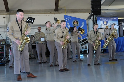 The United States Air Force Band of the West performs during Air Education Training Command's 75th Anniversary Extravaganza, Jan. 23, 2017, at Joint Base San Antonio-Randolph, Texas.  The event was held to mark the command’s 75-year history of training Airmen to fly, fight and win our nation’s wars.  (U.S. Air Force photo by Joel Martinez/Released)