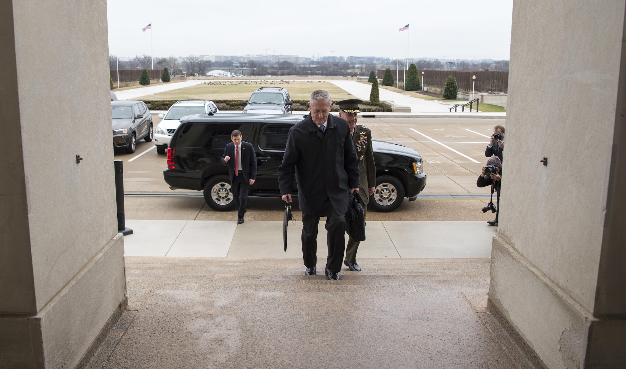 Secretary of Defense James Mattis greets U.S. Marine Corps Gen. Joseph Dunford, Chairman of the Joint Chiefs of Staff, after arriving at the Pentagon in Washington, D.C., Jan. 21, 2017.  (DOD photo by Air Force Tech. Sgt. Brigitte N. Brantley)