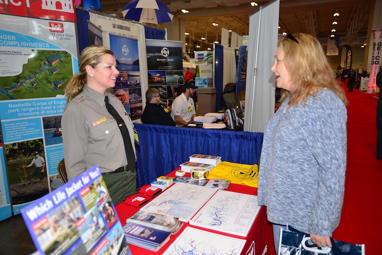 Amber Jones, park ranger at the U.S. Army Corps of Engineers Nashville District’s J. Percy Priest Lake in Nashville, Tenn., talks with an Old Hickory resident during the 31st annual Progressive Nashville Boat & Sportshow at the Nashville Music City Center Jan. 20, 2017.  