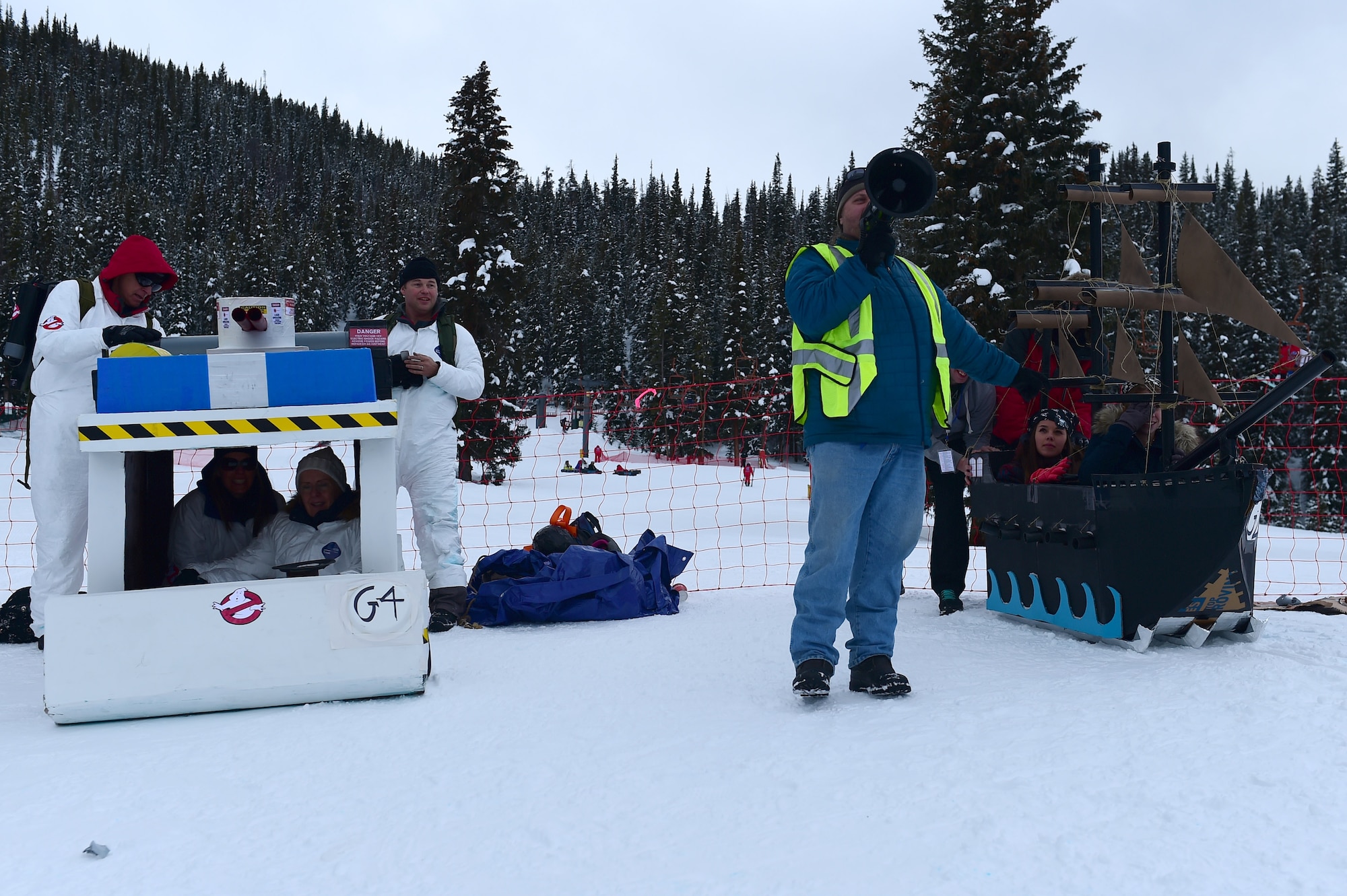 SnoFest cardboard derby participants prepare to race down the hill Jan. 21, 2017, at Copper Mountain, Colo. SnoFest is an annual event for military members and their families from Buckley Air Force Base, Peterson AFB and many others. (U.S. Air Force photo by Airman Jacob Deatherage/Released)