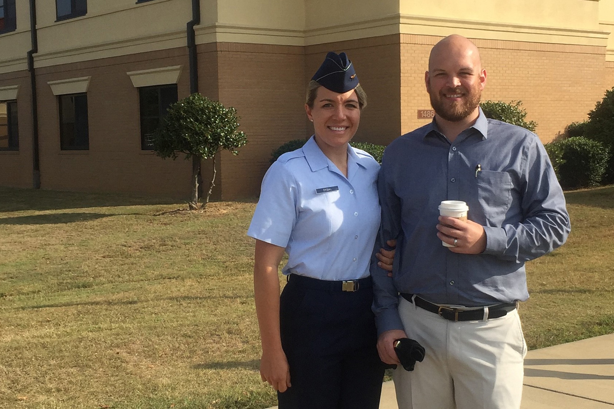 MAXWELL AIR FORCE BASE, Ala. – Second Lt. April Dybal, 6th Space Warning Squadron crew commander at Cape Cod Air Force Station, Mass., greets her husband, Ryan Dybal, at her Officer Training School graduation at Maxwell Air Force Base, Ala.,  in October 2016. Dybal grew up showing and training horses and commissioned in the Air Force for a career in the growing space realm. (Courtesy photo)