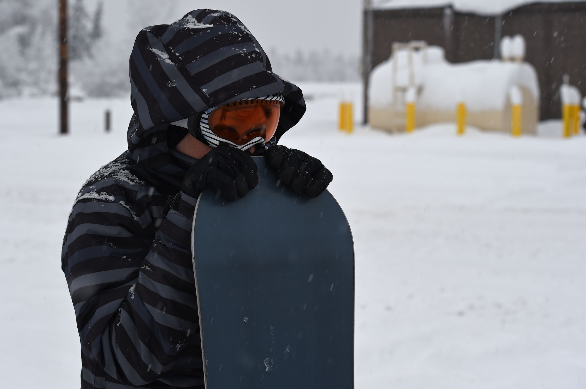 Service members and families snowboard during World Snowboard Day at the Hillberg Ski Area at Joint Base Elmendorf-Richardson, Alaska, Jan. 22, 2017. World Snowboard Day is an opportunity to discover and celebrate snowboarding as sport and culture across the world's summits. The Hillberg Ski Area offers skiing, snowboarding, equipment rentals, lessons and a terrain park. 