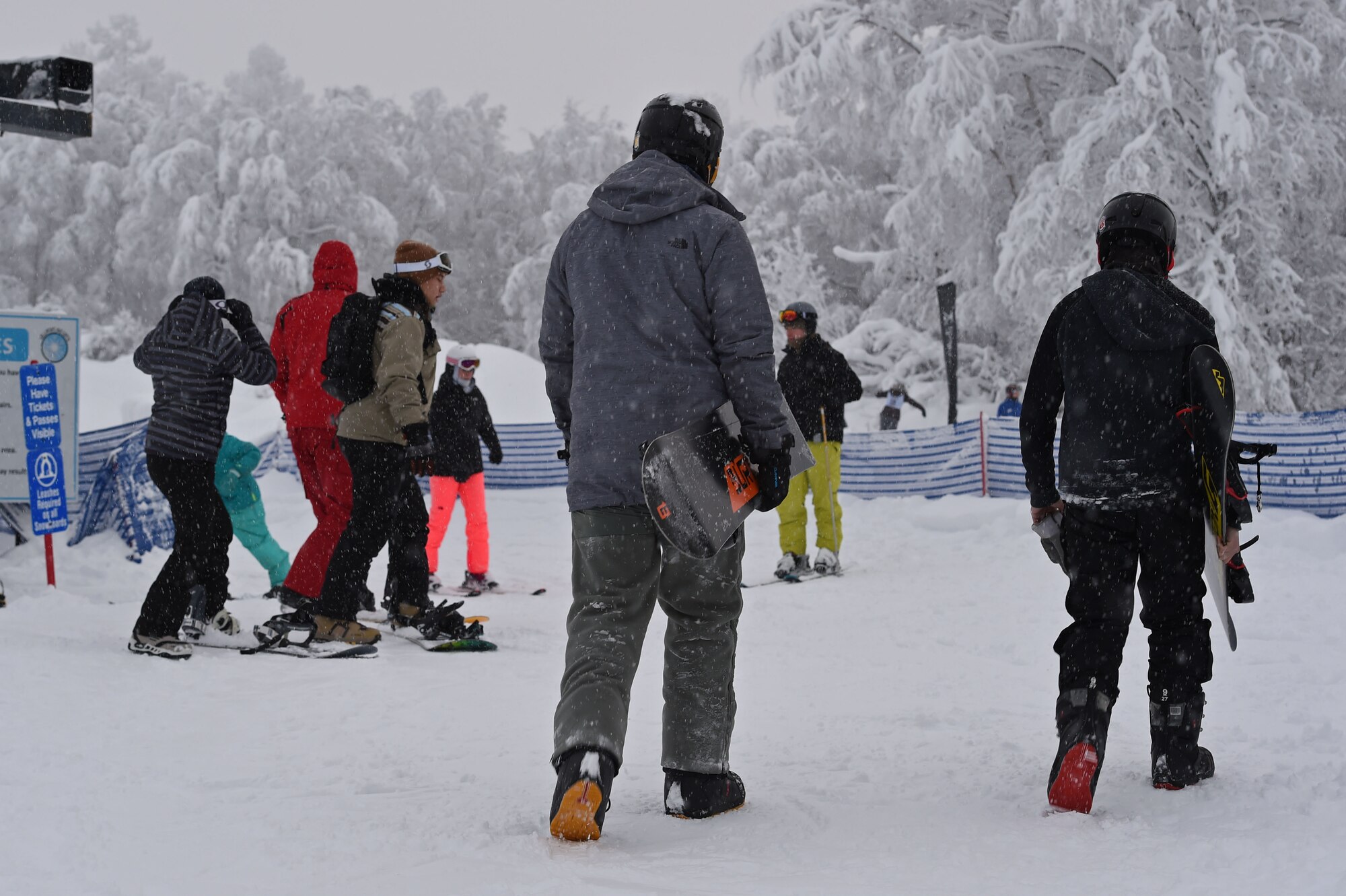 Service members and families snowboard during World Snowboard Day at the Hillberg Ski Area at Joint Base Elmendorf-Richardson, Alaska, Jan. 22, 2017. World Snowboard Day is an opportunity to discover and celebrate snowboarding as sport and culture across the world's summits. The Hillberg Ski Area offers skiing, snowboarding, equipment rentals, lessons and a terrain park. 