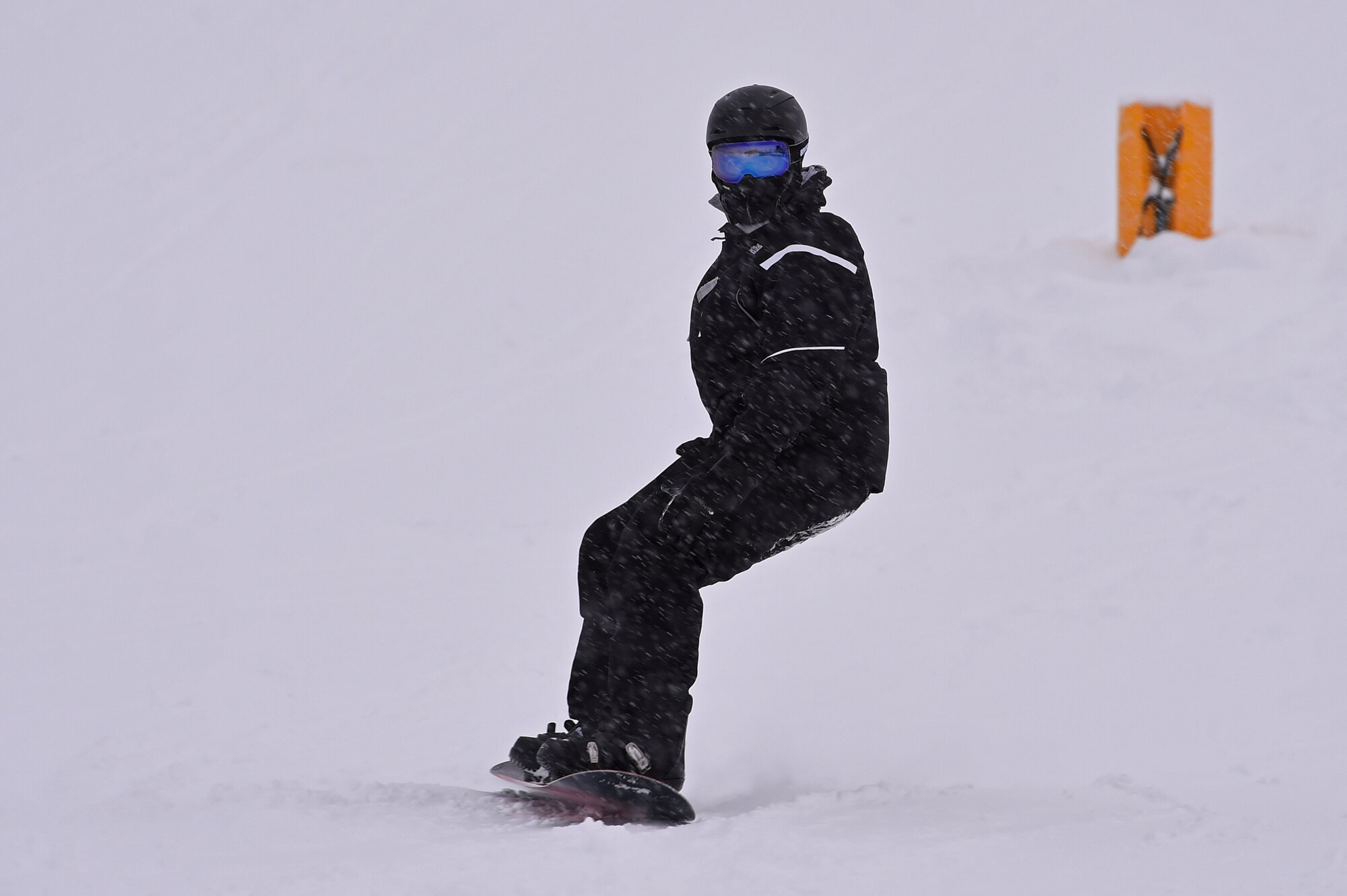 Service members and families snowboard during World Snowboard Day at the Hillberg Ski Area at Joint Base Elmendorf-Richardson, Alaska, Jan. 22, 2017. World Snowboard Day is an opportunity to discover and celebrate snowboarding as sport and culture across the world's summits. The Hillberg Ski Area offers skiing, snowboarding, equipment rentals, lessons and a terrain park. 