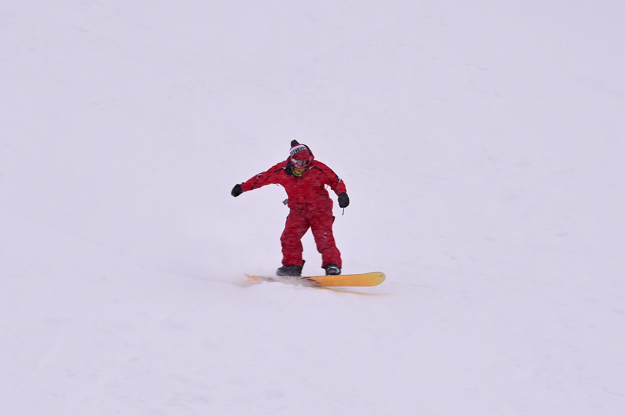 Service members and families snowboard during World Snowboard Day at the Hillberg Ski Area at Joint Base Elmendorf-Richardson, Alaska, Jan. 22, 2017. World Snowboard Day is an opportunity to discover and celebrate snowboarding as sport and culture across the world's summits. The Hillberg Ski Area offers skiing, snowboarding, equipment rentals, lessons and a terrain park. 