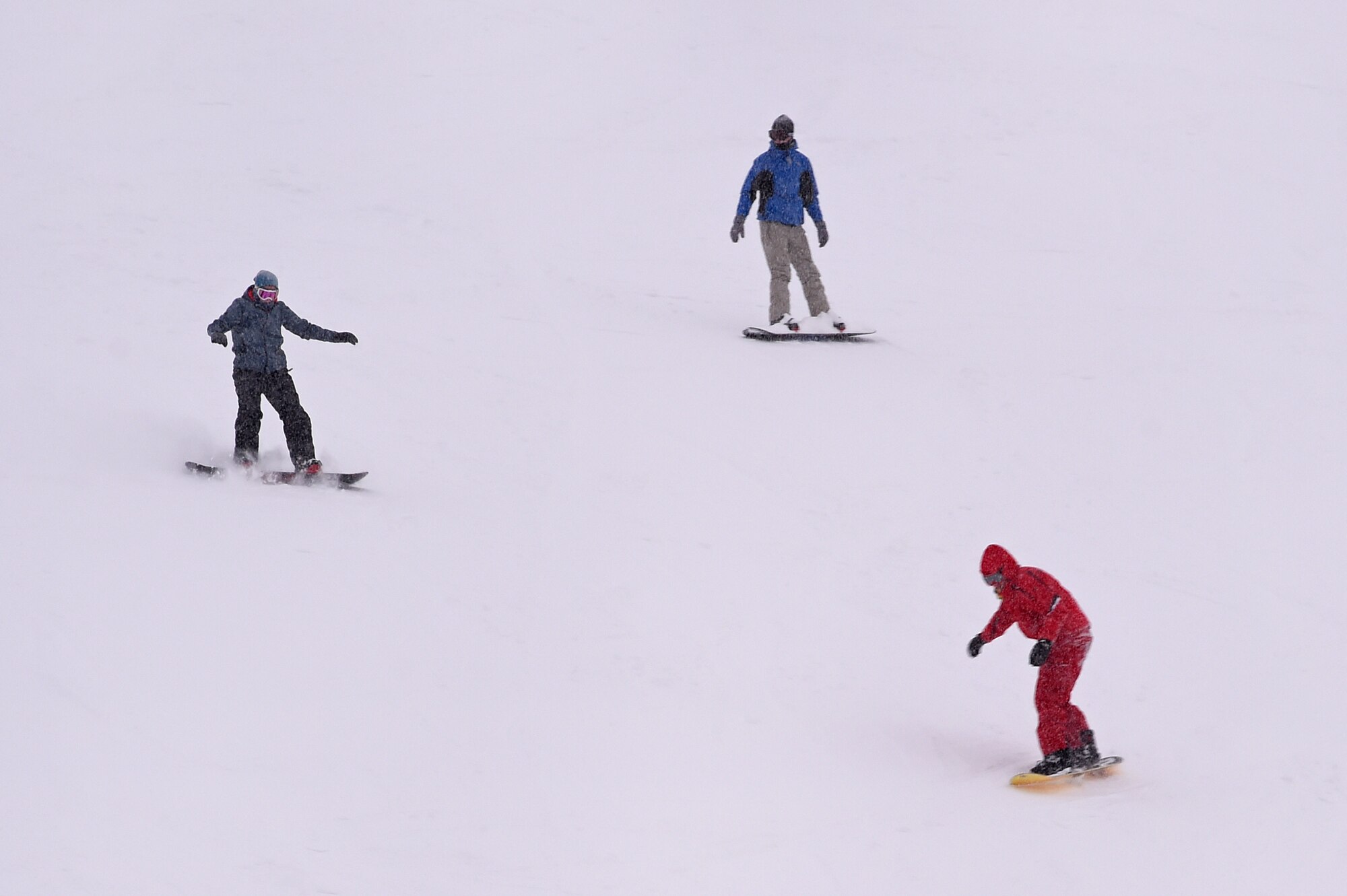 Service members and families snowboard during World Snowboard Day at the Hillberg Ski Area at Joint Base Elmendorf-Richardson, Alaska, Jan. 22, 2017. World Snowboard Day is an opportunity to discover and celebrate snowboarding as sport and culture across the world's summits. The Hillberg Ski Area offers skiing, snowboarding, equipment rentals, lessons and a terrain park. 