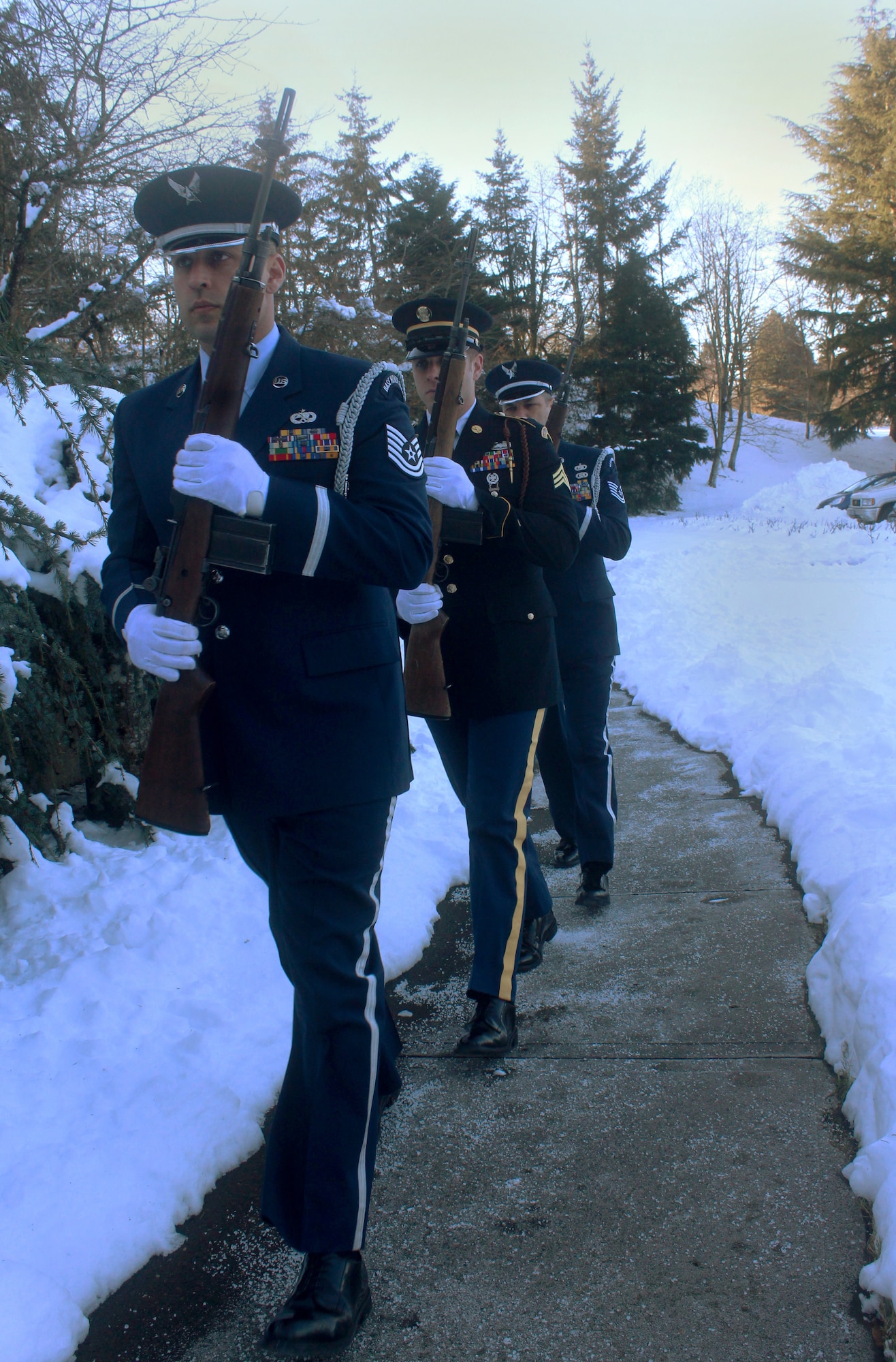A Firing Party detail made up of Oregon Air and Army National Guard members assigned at Willamette National Cemetery, Portland, Ore., march to a firing position as they perform military funeral honors, Jan. 16, 2017. (Photo courtesy of U.S. Air Force Master Sgt. (ret.) Jonathan Dyer)