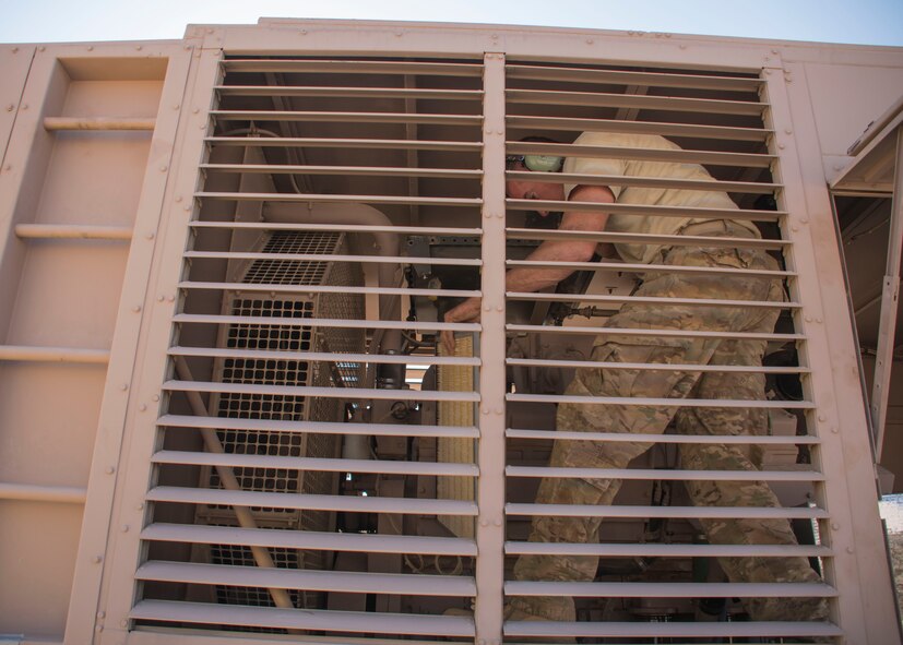 Staff Sgt. Gregory Speed, a 370th Air Expeditionary Advisory Group Detachment 1 electrician craftsman, removes an air filter from a generator at Al Asad Air Base, Iraq Jan. 8, 2017. This is part of preventive maintenance done  after the generator reaches 250 to 300 hours of running time (U.S. Air Force photo/Senior Airman Andrew Park)