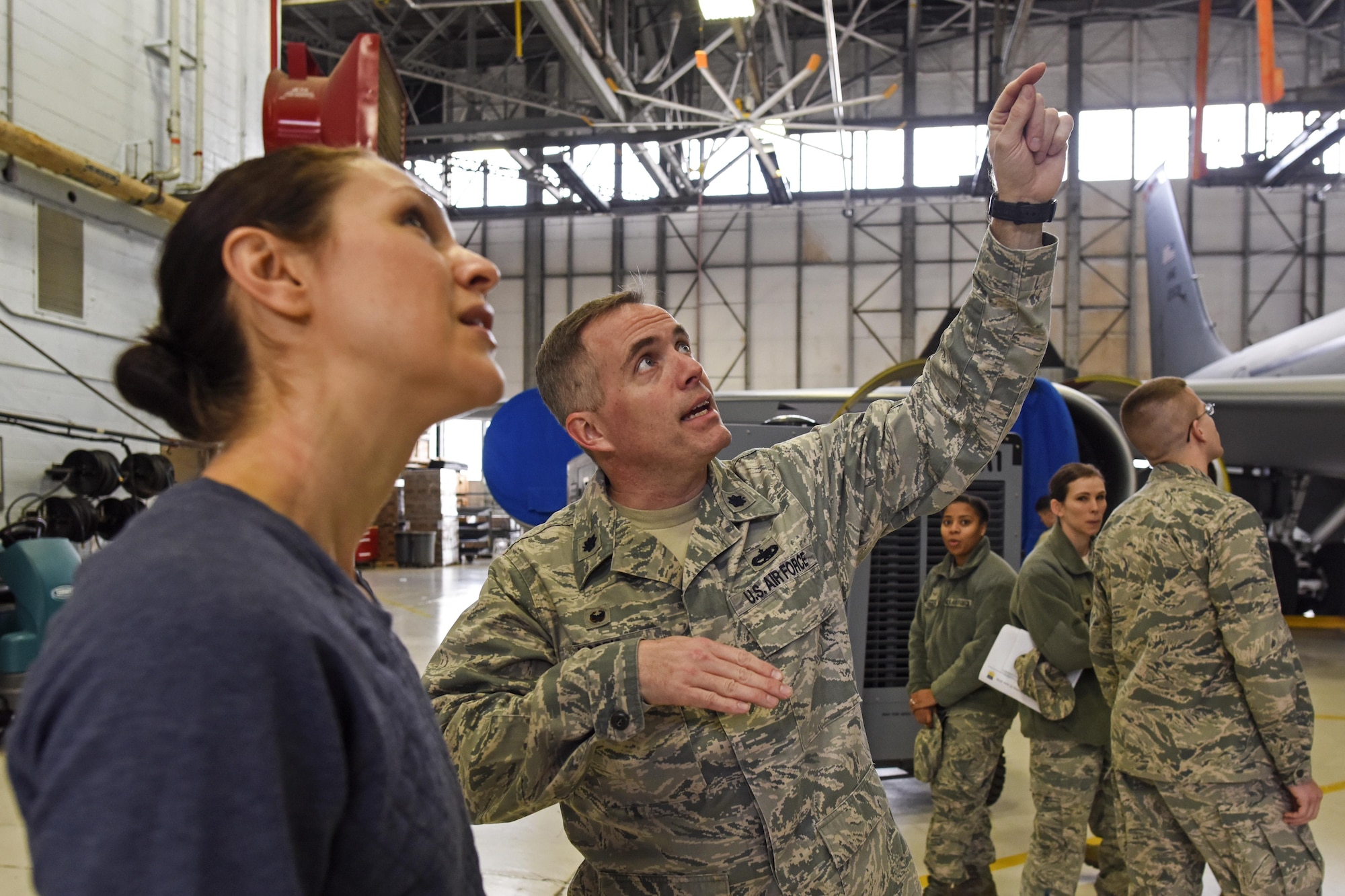 U.S. Air Force Lt. Col. Thomas Norris, 121st Air Refueling Wing Aircraft Maintenance Squadron Commander, gives a new recruit a tour of a KC-135 Stratotanker on Jan. 21, 2017 at Rickenbacker Air National Guard Base, Ohio. Lt. Col. Norris was recently awarded the 2017 Lieutenant General Leo Marquez Award of Maintenance Excellence for field grade officers for the Air National Guard. (U.S. Air National Guard photo by Senior Airman Wendy Kuhn)